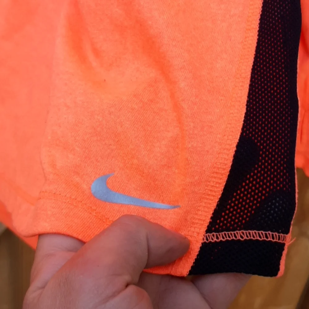 Nike long sleeve orange top w/ black mesh large